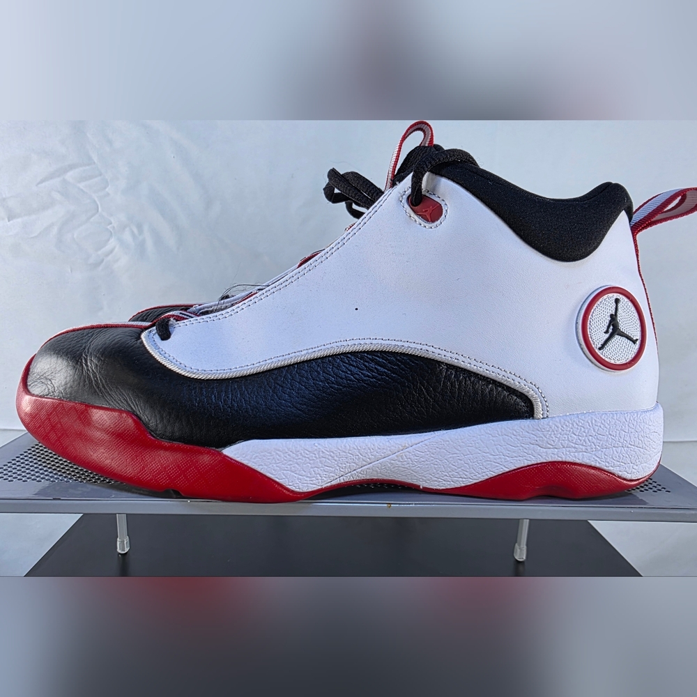 Jordan White and Black Athletic Sneakers with Red Accents